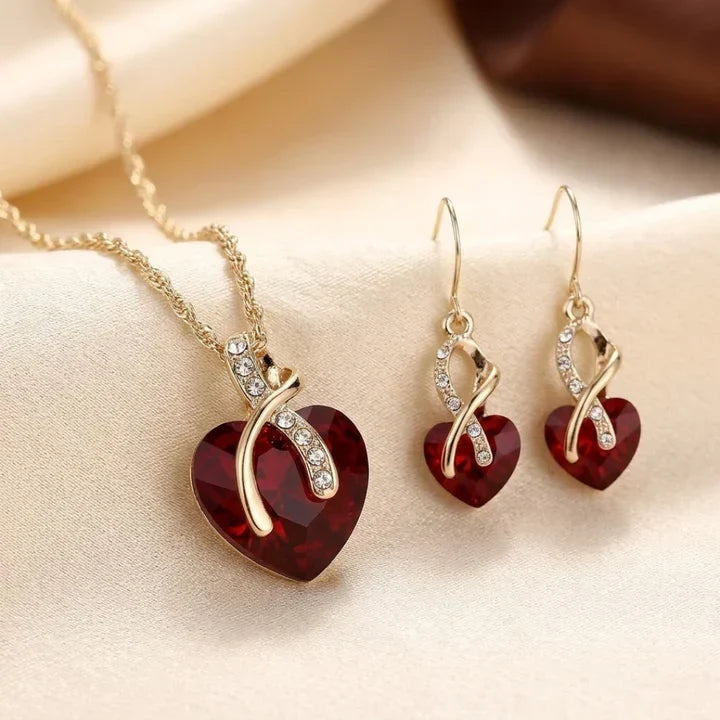 Ensemble de bijoux en cœur torsadé en or et rubis — Doumira