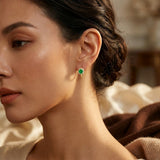 Boucles d'oreilles créoles en or et émeraude — Doumira