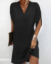 Zéphyrine - Robe Élégante À Manches Fendues Et Coupe Fluide Monochrome
