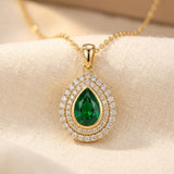 Collier en goutte d'eau en or et émeraude — Doumira
