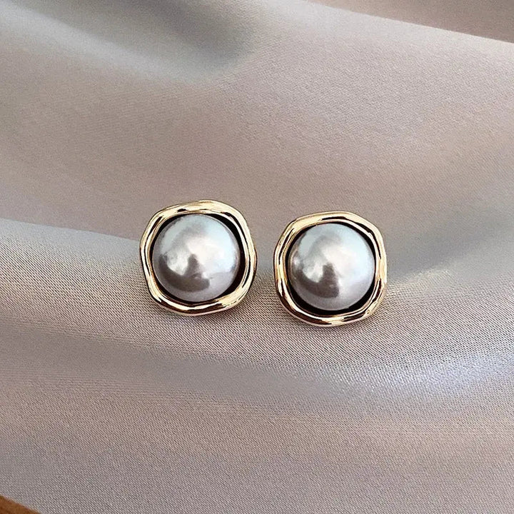 Boucles d'oreilles élégantes en perle noire — Doumira
