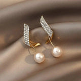 Boucles d'oreilles en or avec perles — Doumira
