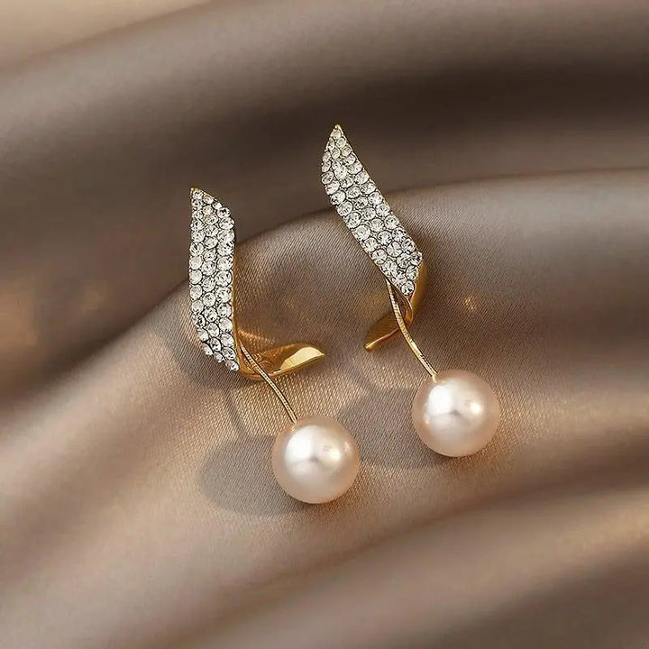 Boucles d'oreilles en or avec perles — Doumira