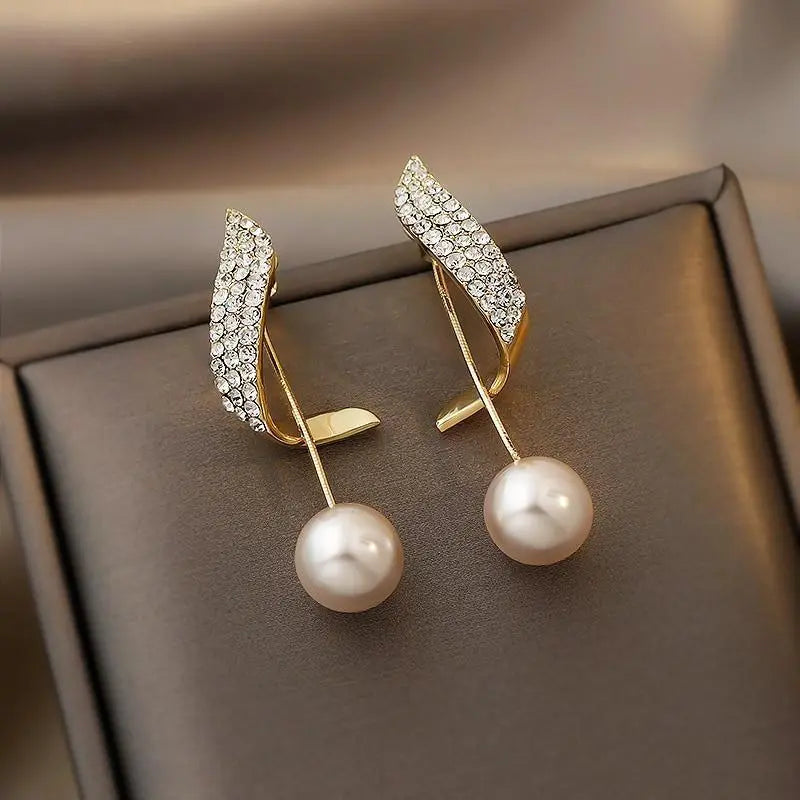 Boucles d'oreilles en or avec perles — Doumira