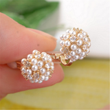 Boucles d'oreilles rétro avec ornement en perles — Doumira