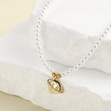 Collier perle planete — Doumira