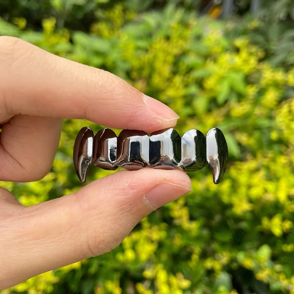 Black grillz — Doumira