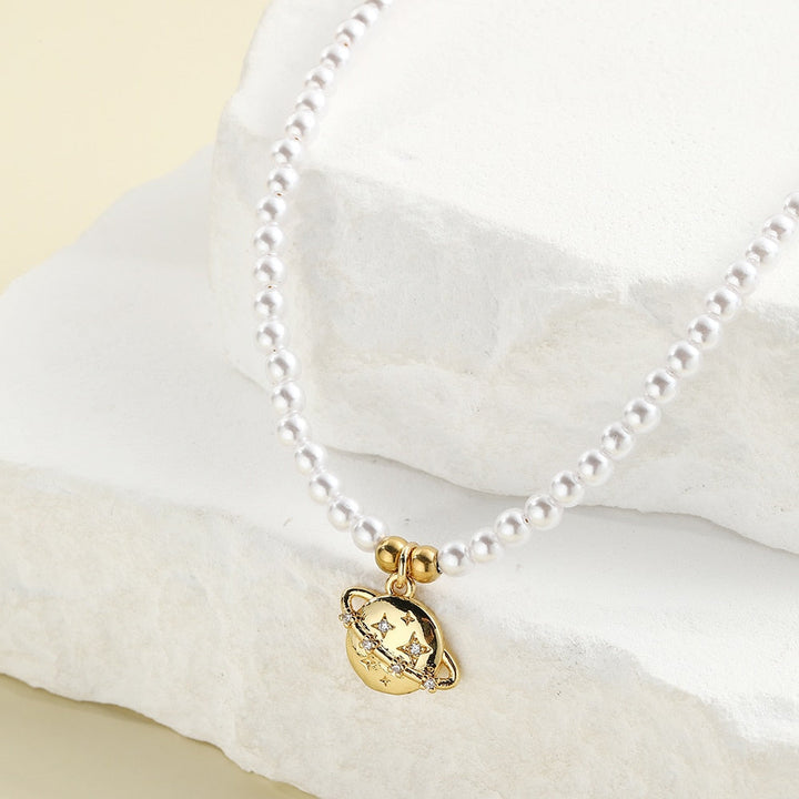 Collier perle planete — Doumira