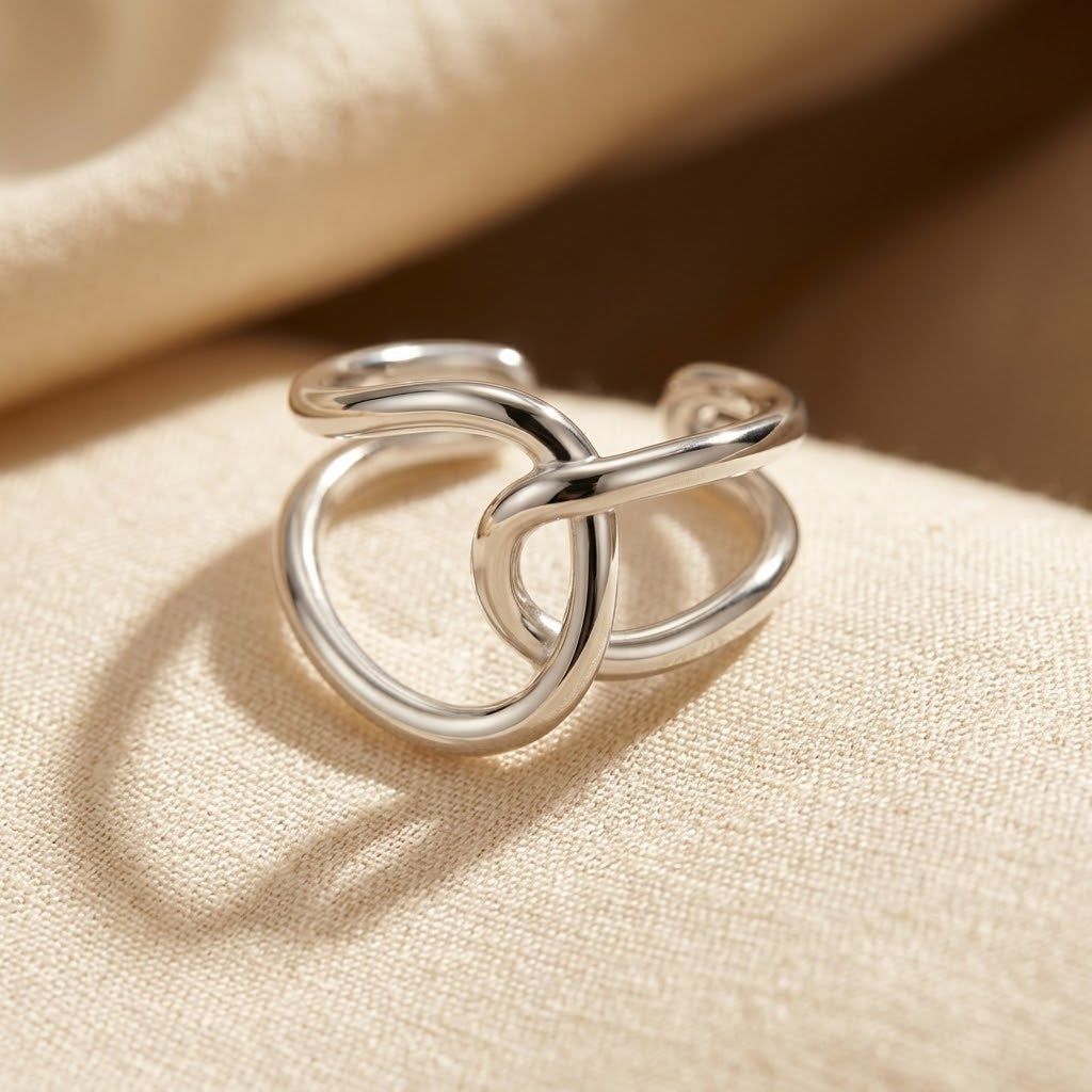 Bague ouverte en argent entrelacée — Doumira