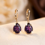 Boucles d'oreilles en or avec goutte d'améthyste — Doumira